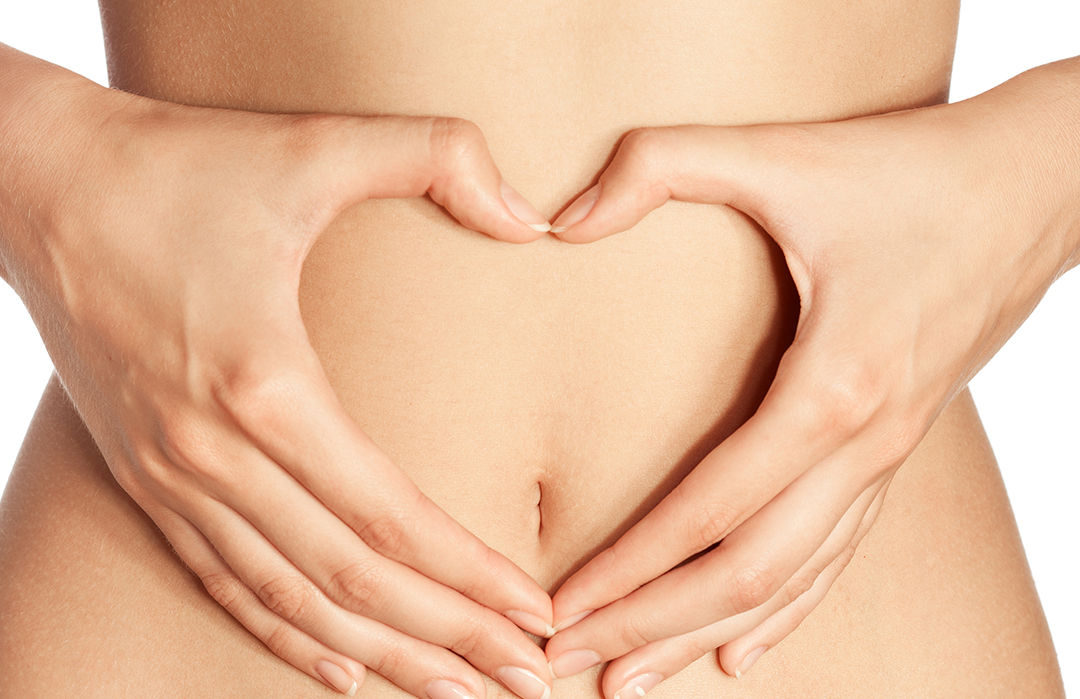 Image of a heart over a woman's stomach