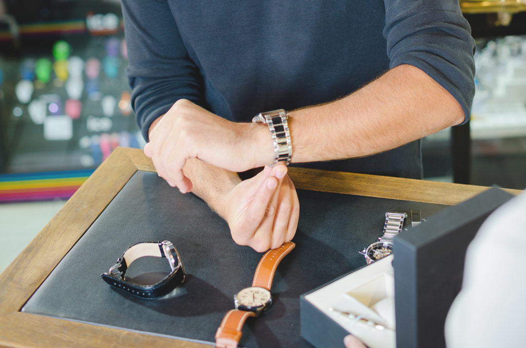 Man shopping for a watch